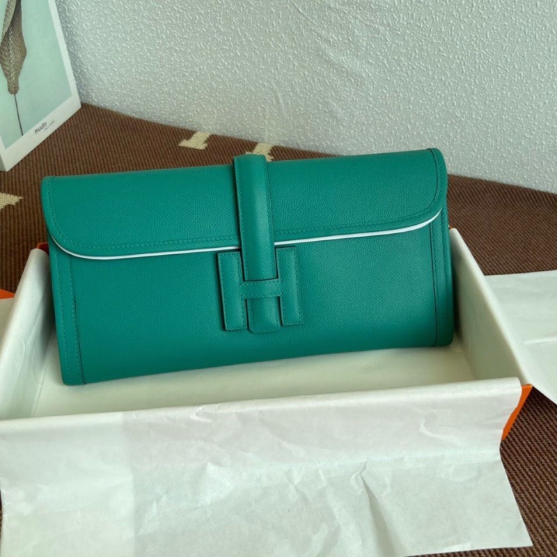 H**mes clutch bags